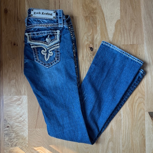 Rock Revival Denim - Women’s Rock Revival Buckle Exclusive Fleur De Lis Bootcut Jeans - Size 26